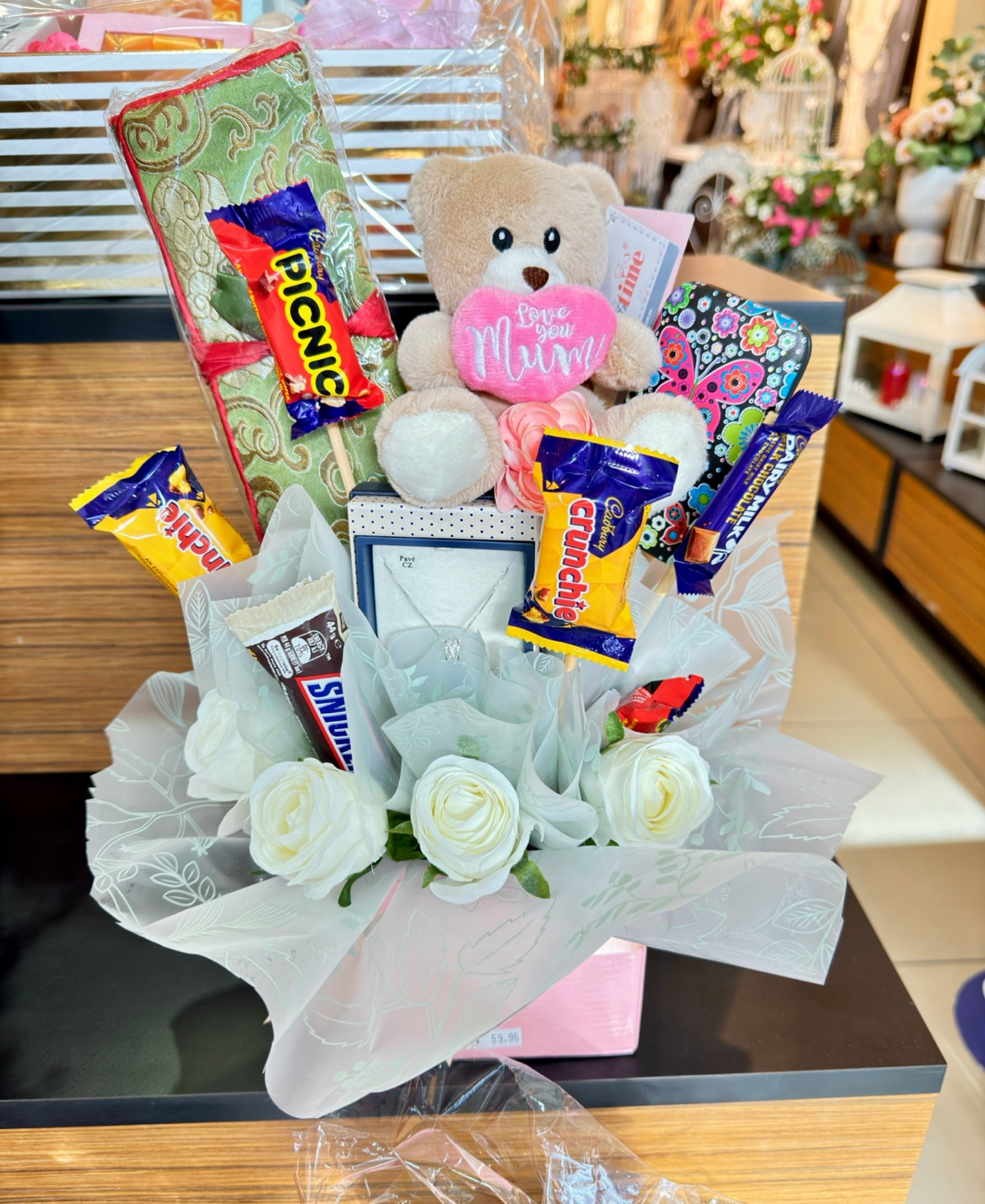 "Mother's Day gift hamper with assorted chocolates, 'Love You Mum' plush bear"